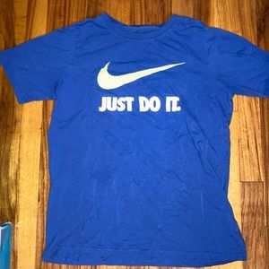 Kids, blue nike T-shirt with neon green swoosh